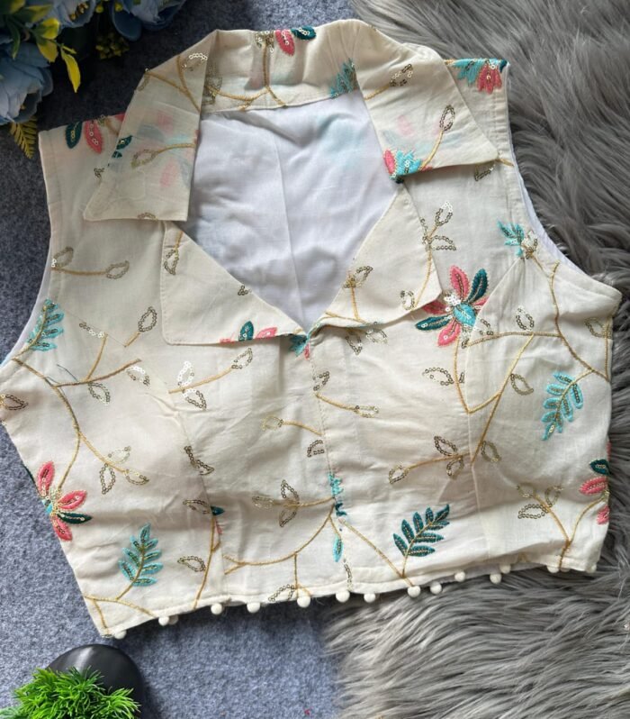 Off white sleeveless cotton embroidery blouse